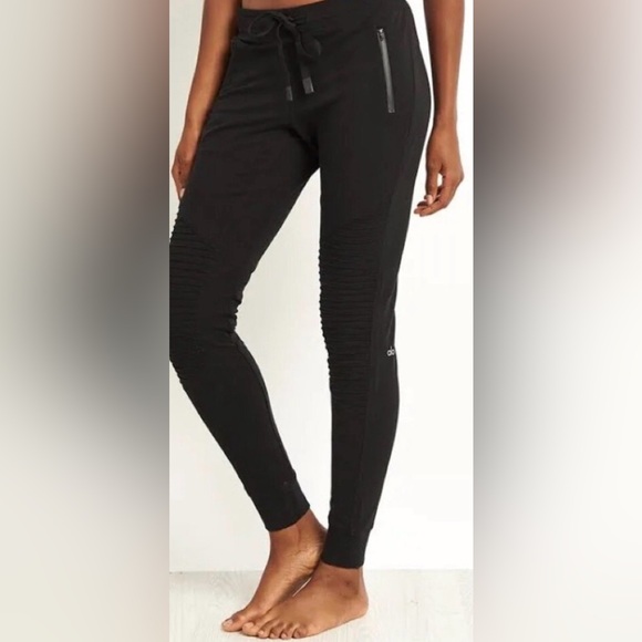 ALO Yoga Pants - Alo Yoga Urban Moto sweatpants featuring ribbe panels and zippered pockets